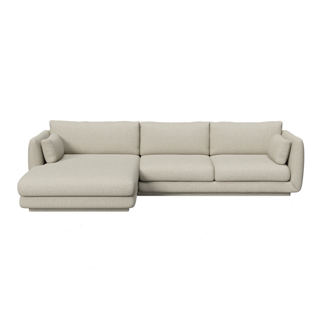 Light beige sectional sofa with a smooth, minimalist design and subtle texture. Ideal for modern living spaces.