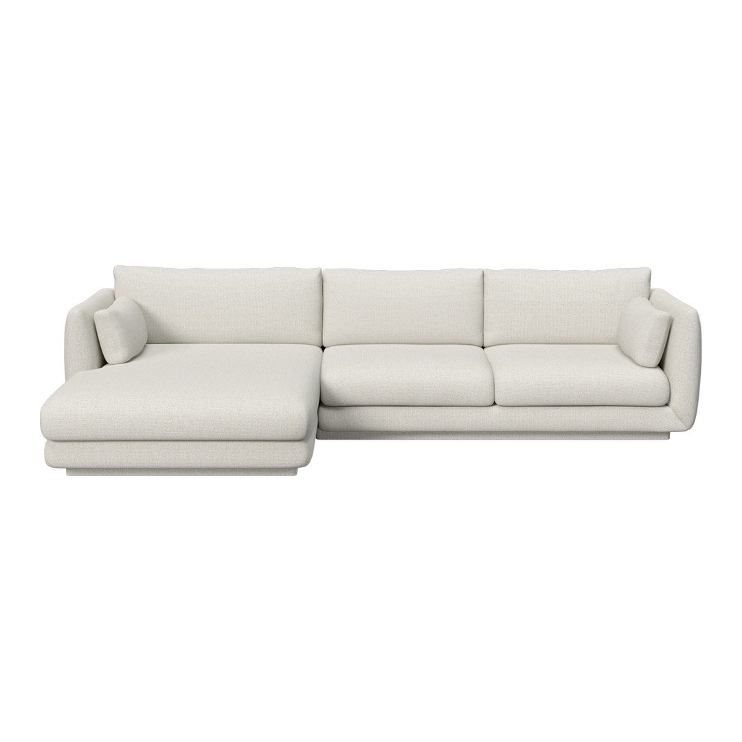 "Modern beige sectional sofa with clean lines and plush cushions, perfect for contemporary living spaces."