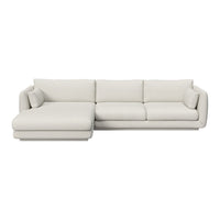 "Modern beige sectional sofa with clean lines and plush cushions, perfect for contemporary living spaces."