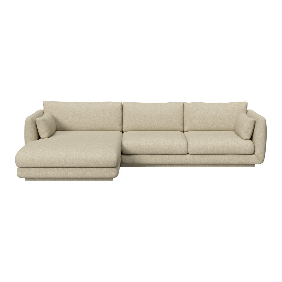 Beige sectional sofa with a smooth, solid pattern and clean, modern lines, perfect for contemporary interiors.