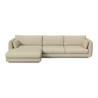 Beige sectional sofa with a smooth, solid pattern and clean, modern lines, perfect for contemporary interiors.