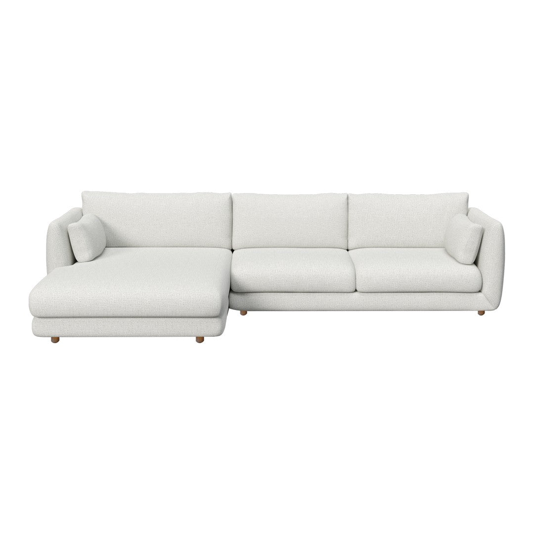 Modern white sectional sofa with clean lines and plush cushions, perfect for contemporary interiors.