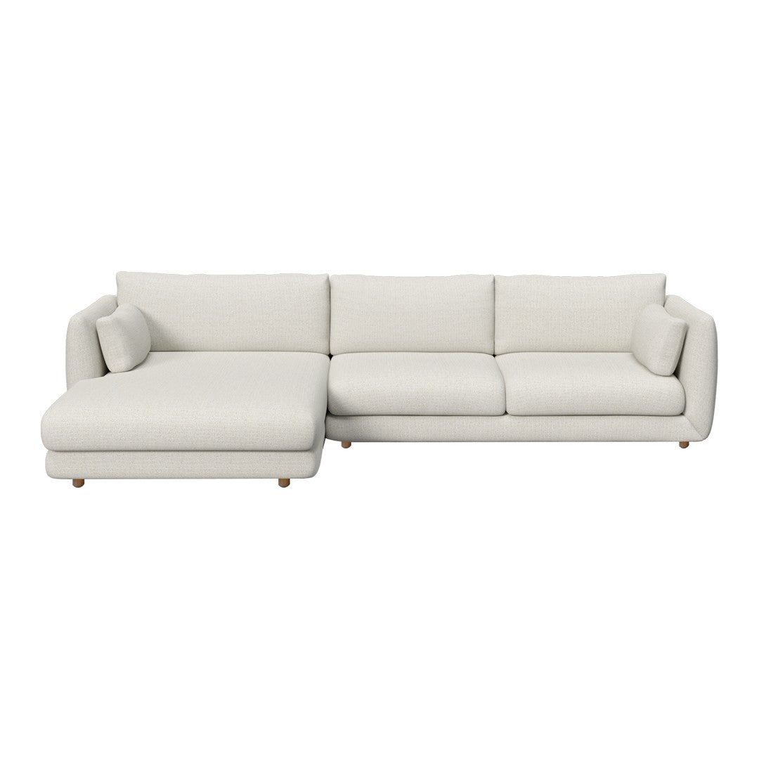 Light beige sectional sofa with smooth texture and clean, modern lines. Perfect for contemporary living spaces.