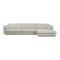 Light beige sectional sofa with a smooth, minimalist design and plush cushions. Ideal for modern living spaces.