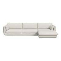 Lush cream sectional sofa with smooth, solid pattern and contemporary design, perfect for modern living spaces.