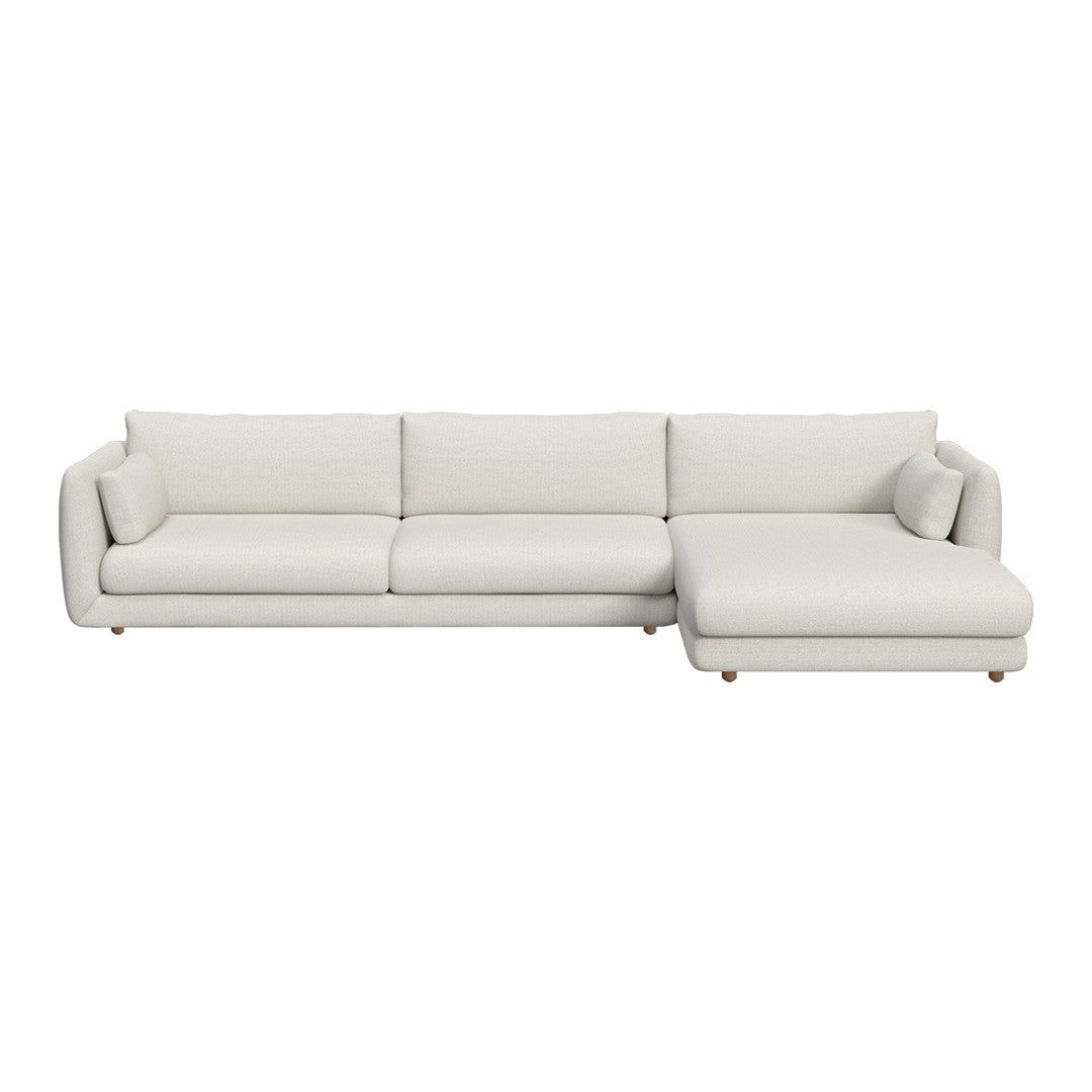 Modern white sectional sofa with a smooth leather finish and clean lines, perfect for contemporary interiors.