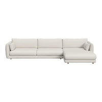 Modern white sectional sofa with a smooth leather finish and clean lines, perfect for contemporary interiors.