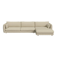 Beige sectional sofa with minimalist design, plush fabric texture, and smooth, clean lines for modern decor.