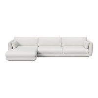 Modern white sectional sofa with smooth upholstery, featuring a minimalist design and clean lines.