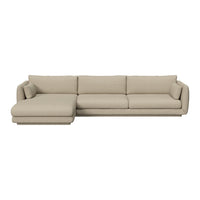 Beige sectional sofa with clean lines and smooth fabric, perfect for modern living spaces.