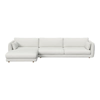 Modern white sectional sofa with plush cushions and minimalist design, perfect for contemporary living spaces.