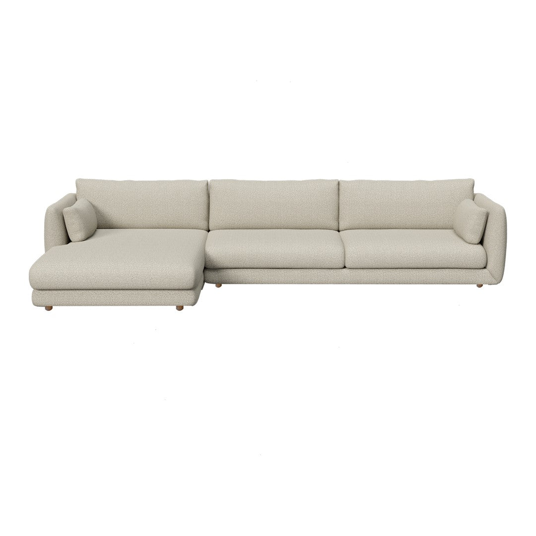 Beige sectional sofa with a smooth, textured fabric and simple, modern design. Ideal for contemporary living spaces.