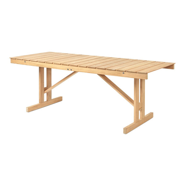 Light natural wood dining table with smooth, slatted surface and minimalist design. Ideal for modern or rustic decor.