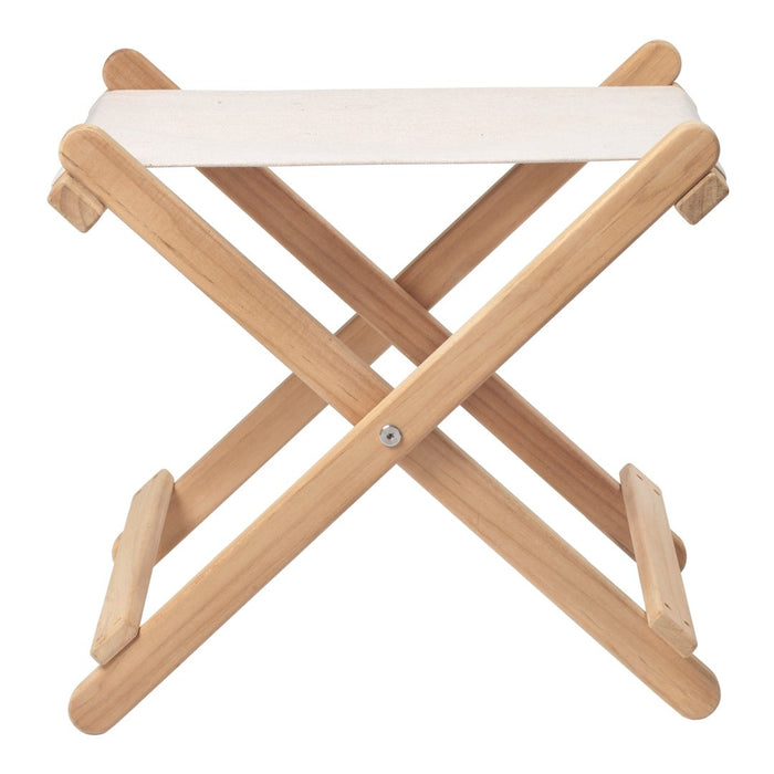 Light wooden folding stool with a simple beige fabric seat, featuring a clean, minimalist design.