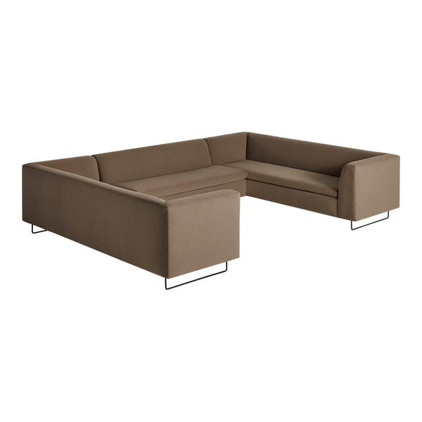 Stylish L-shaped sofa in rich brown fabric with a modern, minimalistic design and sleek black metal legs.