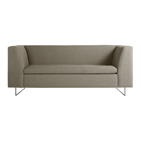 Neutral beige sofa with a sleek, modern design and subtle texture, featuring a minimalist style and stainless steel legs.
