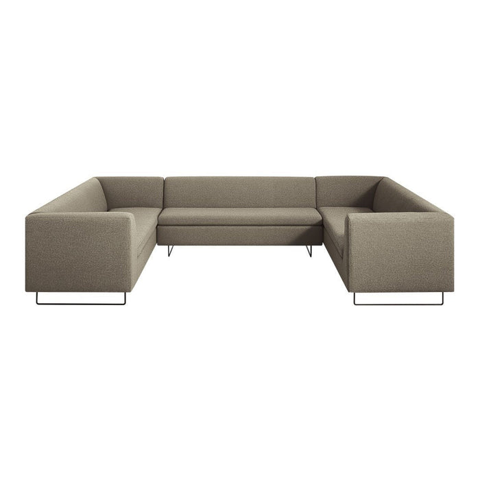 Stylish L-shaped sectional sofa in muted taupe fabric with sleek metal legs, creating a modern, minimalist look.
