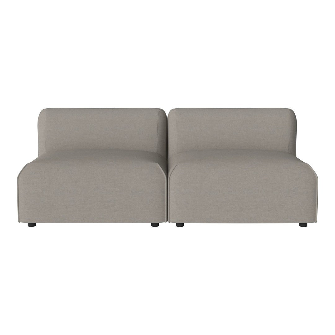 Light gray modular sofa with a smooth, minimalist design and no visible patterns. Ideal for modern decor.