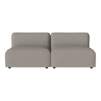 Light gray modular sofa with a smooth, minimalist design and no visible patterns. Ideal for modern decor.