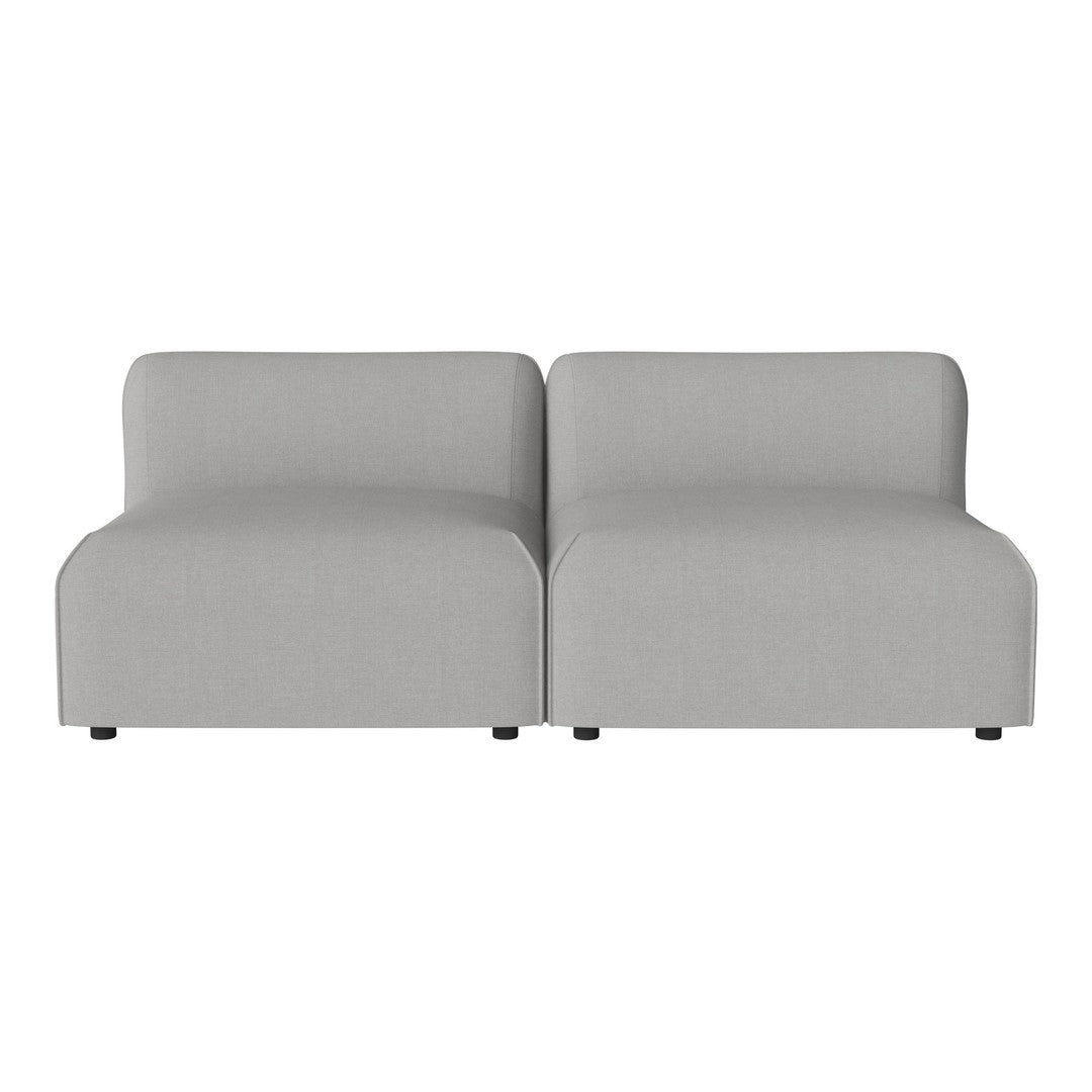 Light gray modern sofa with a smooth, minimalist design, featuring clean lines and no visible patterns.