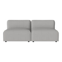 Light gray modern sofa with a smooth, minimalist design, featuring clean lines and no visible patterns.