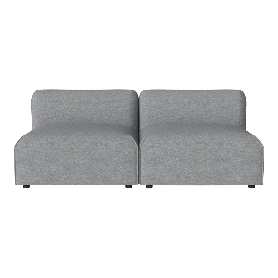 Modern gray modular sofa with a sleek, minimalist design and smooth fabric texture. Perfect for contemporary spaces.