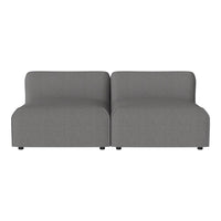 Gray modular sofa with smooth texture and minimalist design, perfect for modern living spaces.