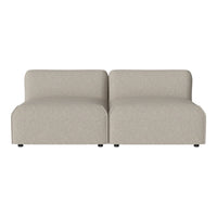 Beige upholstered modular sofa with smooth, minimalist design and subtle texture, perfect for any modern living space.