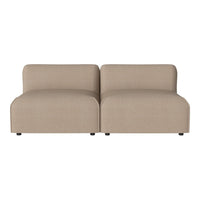 Beige modular sofa with a sleek, minimalist design and smooth, textured fabric. Perfect for modern living spaces.