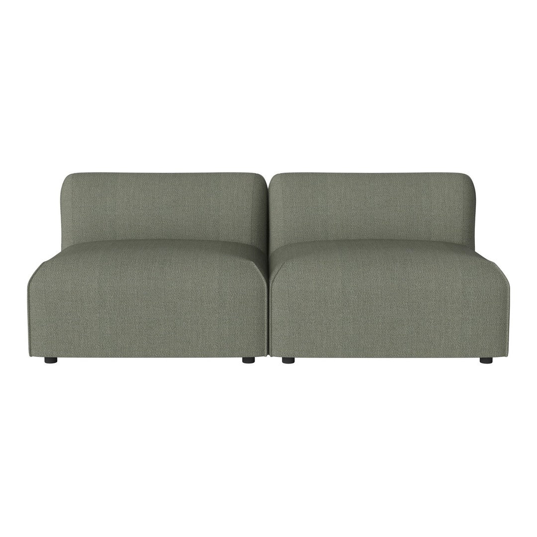 Green modern sofa with a minimalist design and soft, textured upholstery, perfect for contemporary living spaces.