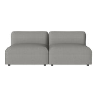 Gray upholstered modular sofa with a smooth, solid pattern, featuring clean lines and a contemporary design.