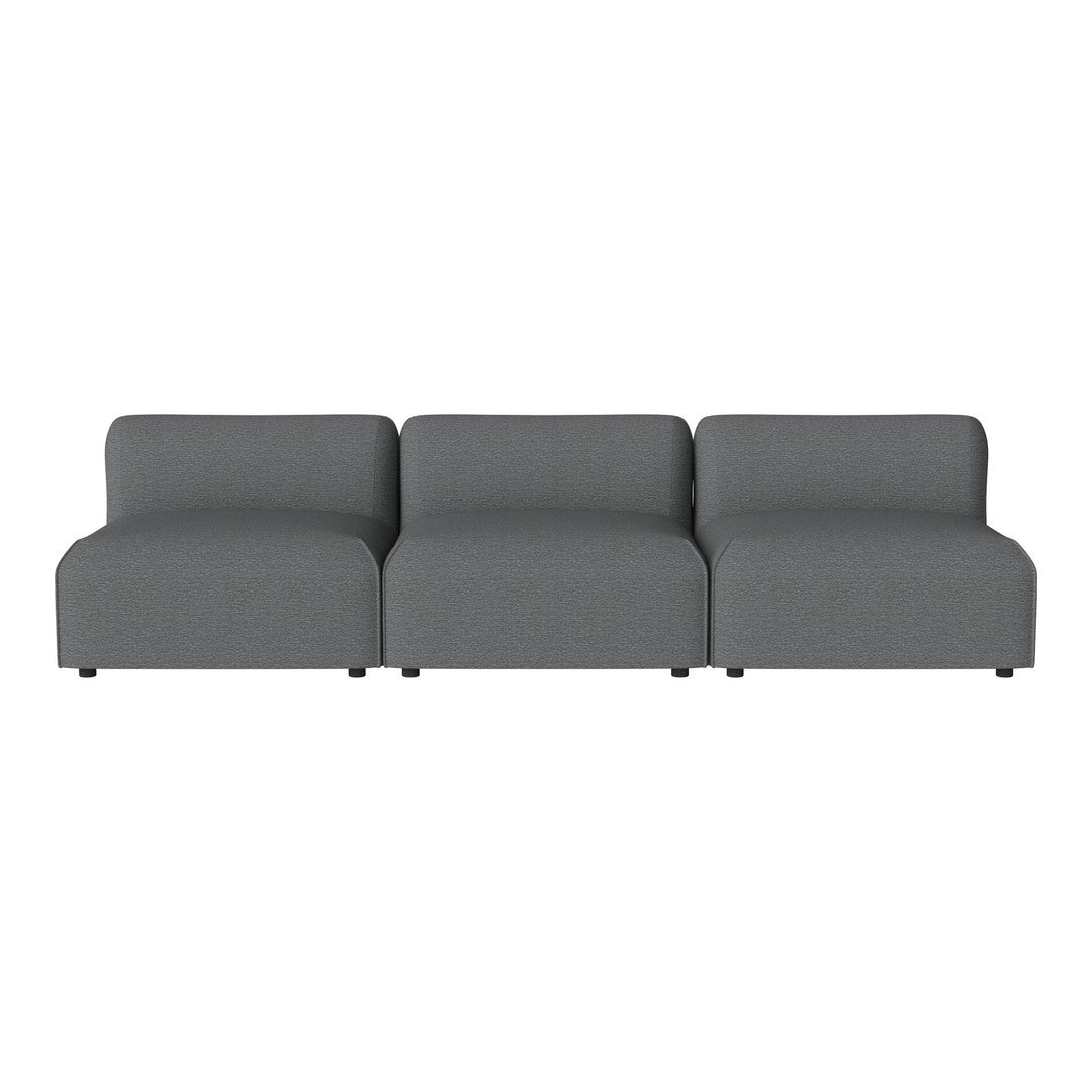 Grey modular sofa with a sleek, minimalist design and soft fabric texture, perfect for modern living spaces.
