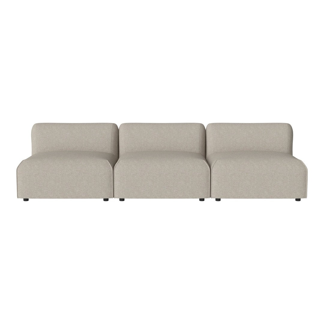 "Three-seat sofa in a soft beige fabric with a smooth, minimalist design and no visible patterns."