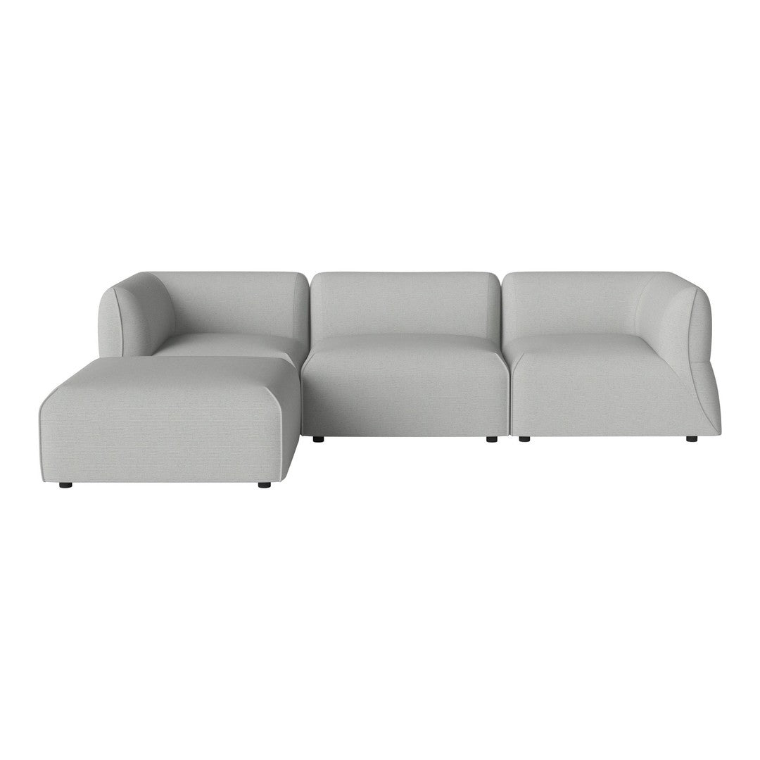 Light gray sectional sofa with smooth, minimalist design and no visible patterns. Ideal for modern living spaces.