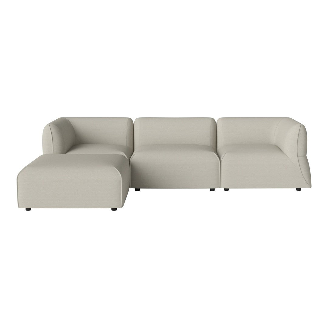 Light beige sectional sofa with a smooth, minimalist design and rounded edges. Perfect for modern decor.