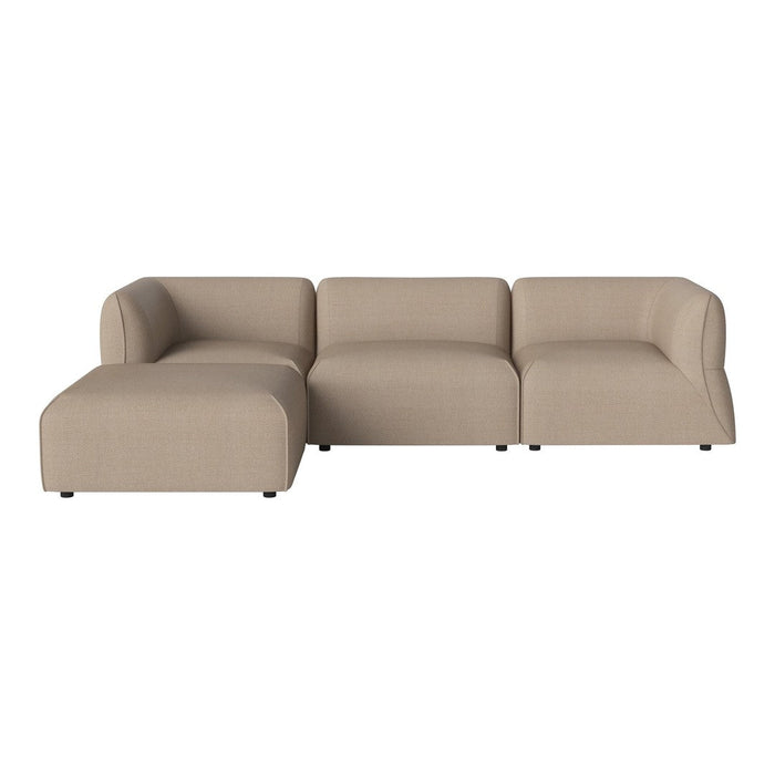Beige sectional couch with a modern, minimalist design and smooth, textured fabric. Suitable for various interior styles.