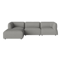Light gray upholstered sectional sofa with smooth, minimalist design and no visible patterns. Perfect for modern decor.