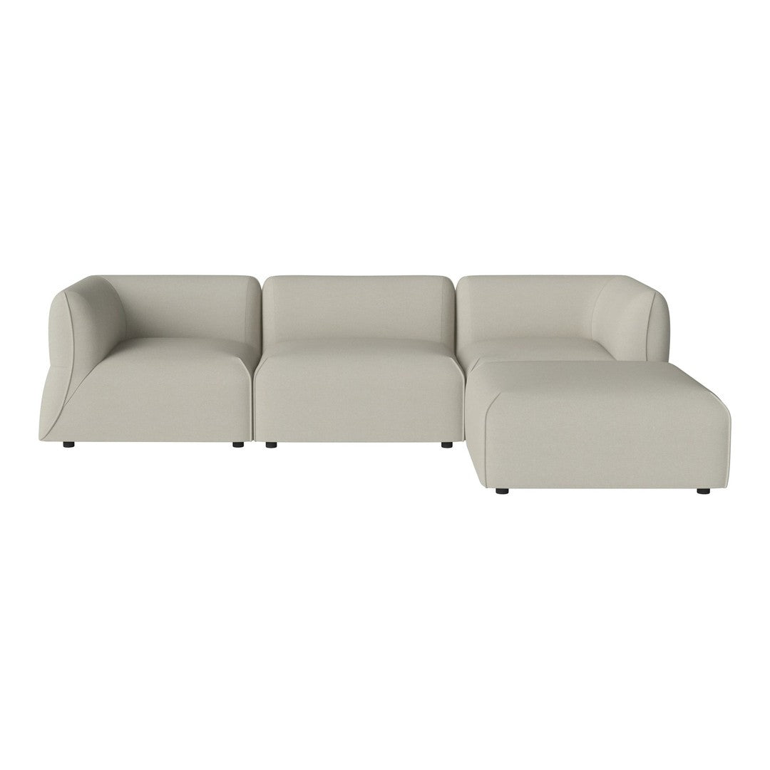 Light beige sectional sofa with smooth, minimalist design and no visible patterns, perfect for modern interiors.