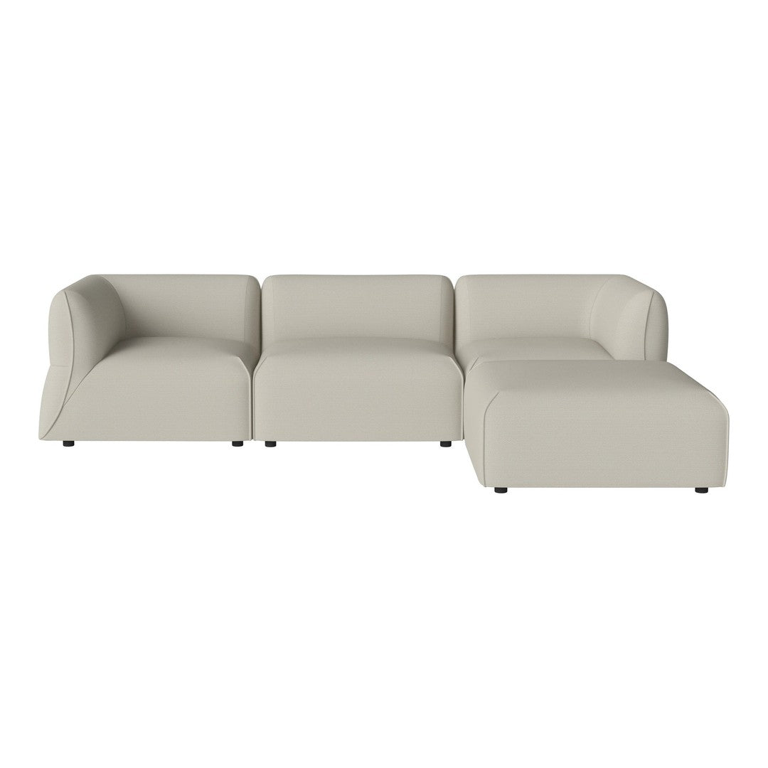 Beige modular sofa with smooth, contemporary design and rounded edges, perfect for modern living spaces.