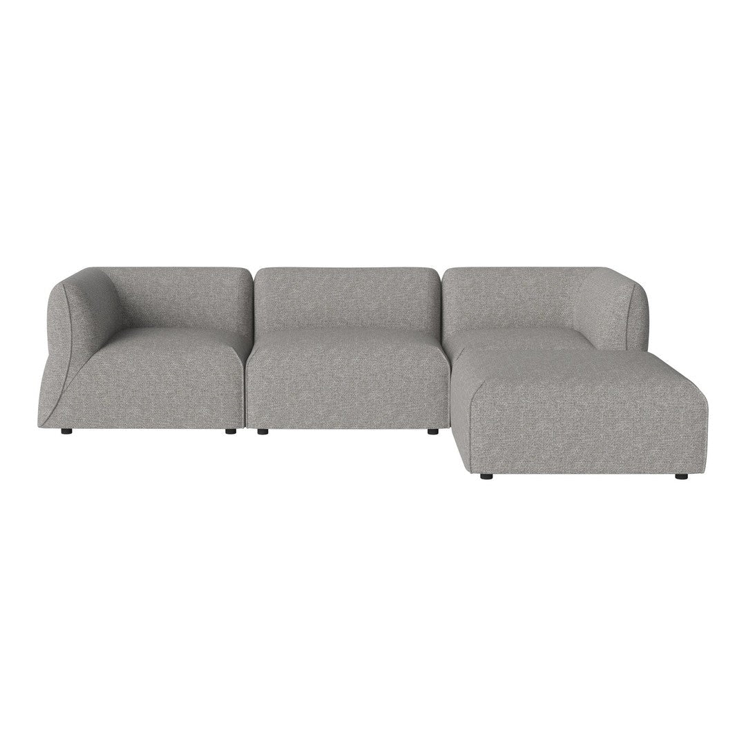 Gray sectional sofa with a smooth texture and contemporary design. Ideal for modern living spaces.