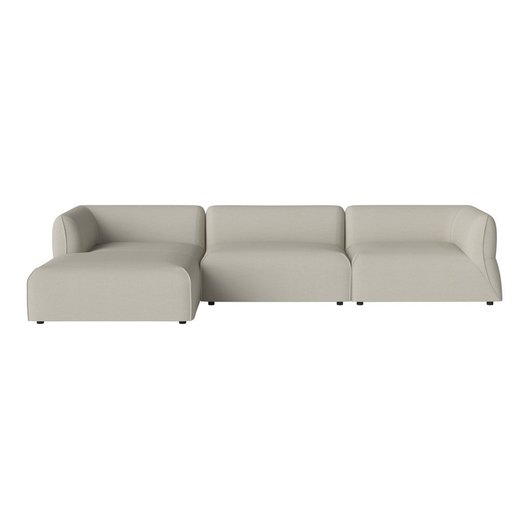 Light gray modern sectional sofa with smooth, solid pattern and clean lines for a minimalist aesthetic.
