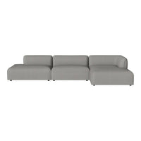 Modern sectional sofa in light gray fabric with a minimalist design and no visible patterns. Stylish and versatile.