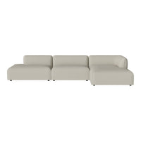 Light beige sectional sofa with a smooth, modern design and clean lines, perfect for contemporary living spaces.