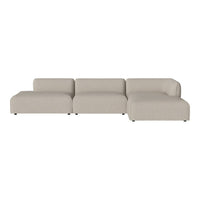 Light beige modular sectional sofa with a smooth, modern design and no visible patterns.