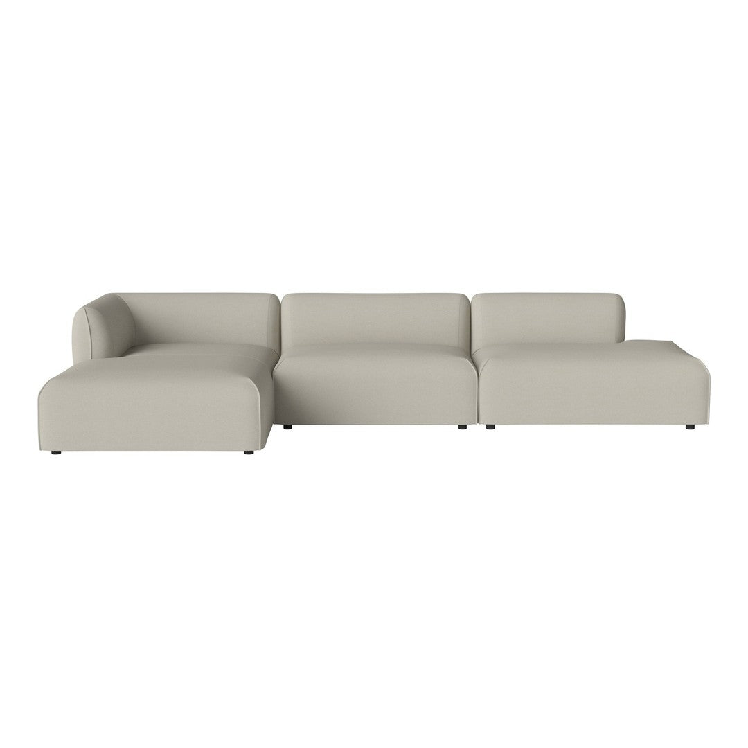 Light beige sectional sofa with a minimalist design and smooth, modern lines. Ideal for contemporary living spaces.