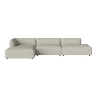 Light beige modular sofa with smooth, minimalist design and soft curves, perfect for modern living spaces.