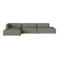 Light olive green sectional sofa with a sleek, modern design and minimalist silhouette.