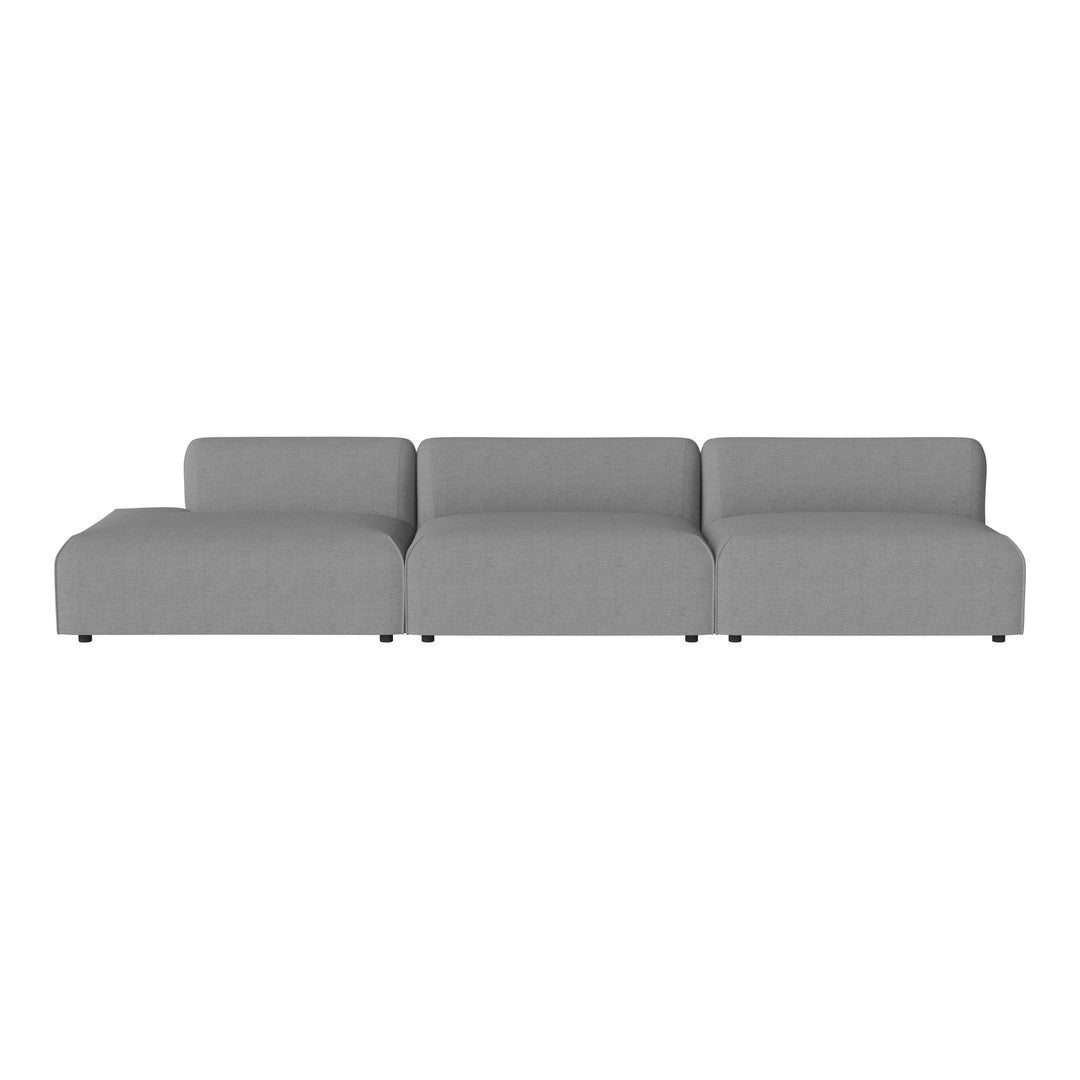 Gray modular sofa with a minimalist design and sleek, smooth fabric surface. Perfect for modern living spaces.