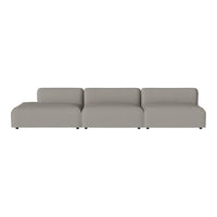 Modern sectional sofa in light gray upholstery, featuring a minimalist design with smooth, clean lines and no patterns.