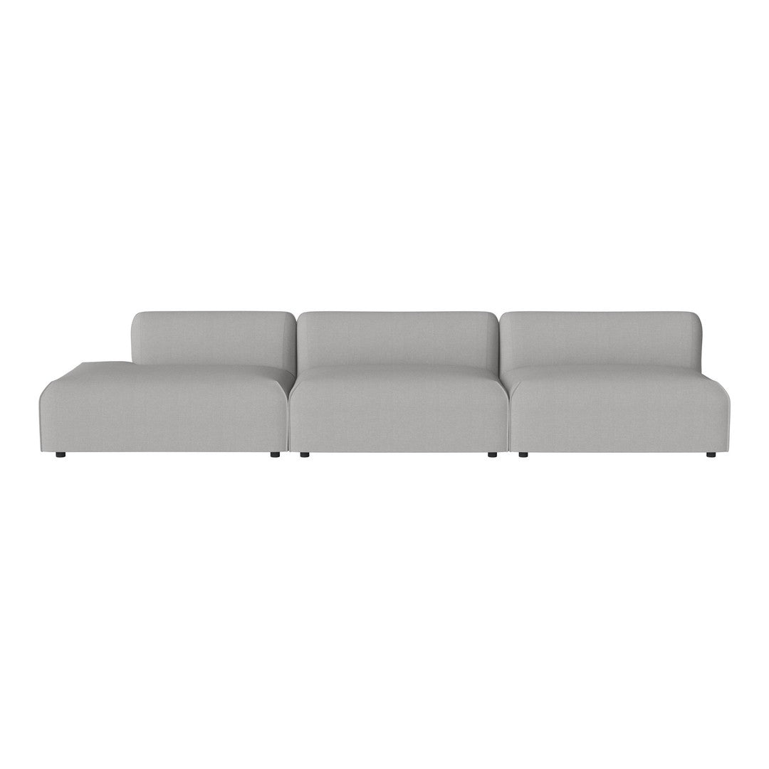 Modern sectional sofa in a soft, light gray fabric with clean lines and minimalistic design. Ideal for any living space.